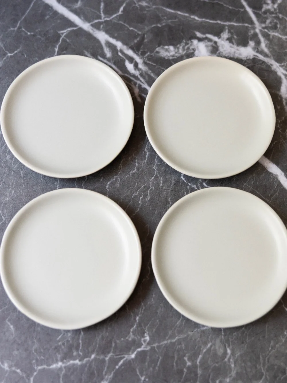 Set of 4 gray small ceramic plates Crate and Barrel made in Thailand 4.5 inches